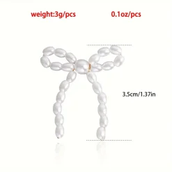 Σκουλαρίκια με πέρλες σε σχήμα φιόγκο