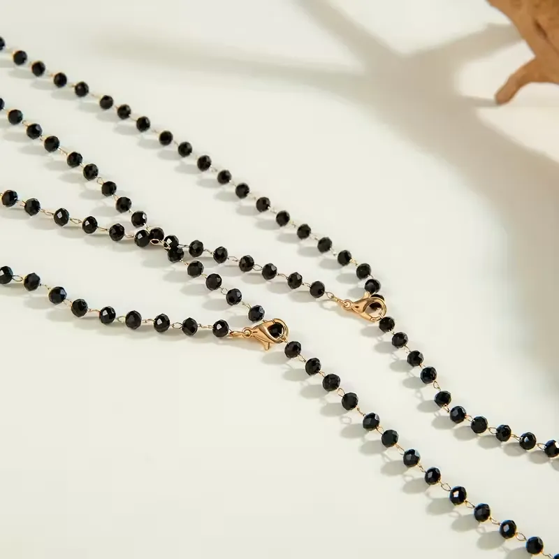 Μακρύ Κολιέ Lariat από Μαύρες Χάντρες με Χρυσή Καρδιά