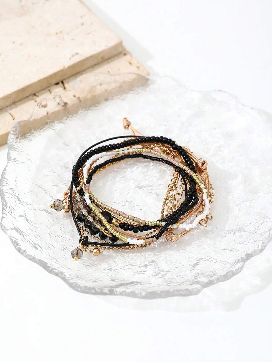 Σετ 8 Boho Βραχιόλια με Χάντρες και Χρυσές Λεπτομέρειες - Μαύρο & Beige