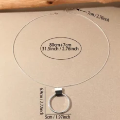 Γυναικείο μακρύ κολιέ με χρυσό γεωμετρικό κύκλο και δερμάτινη λεπτομέρεια