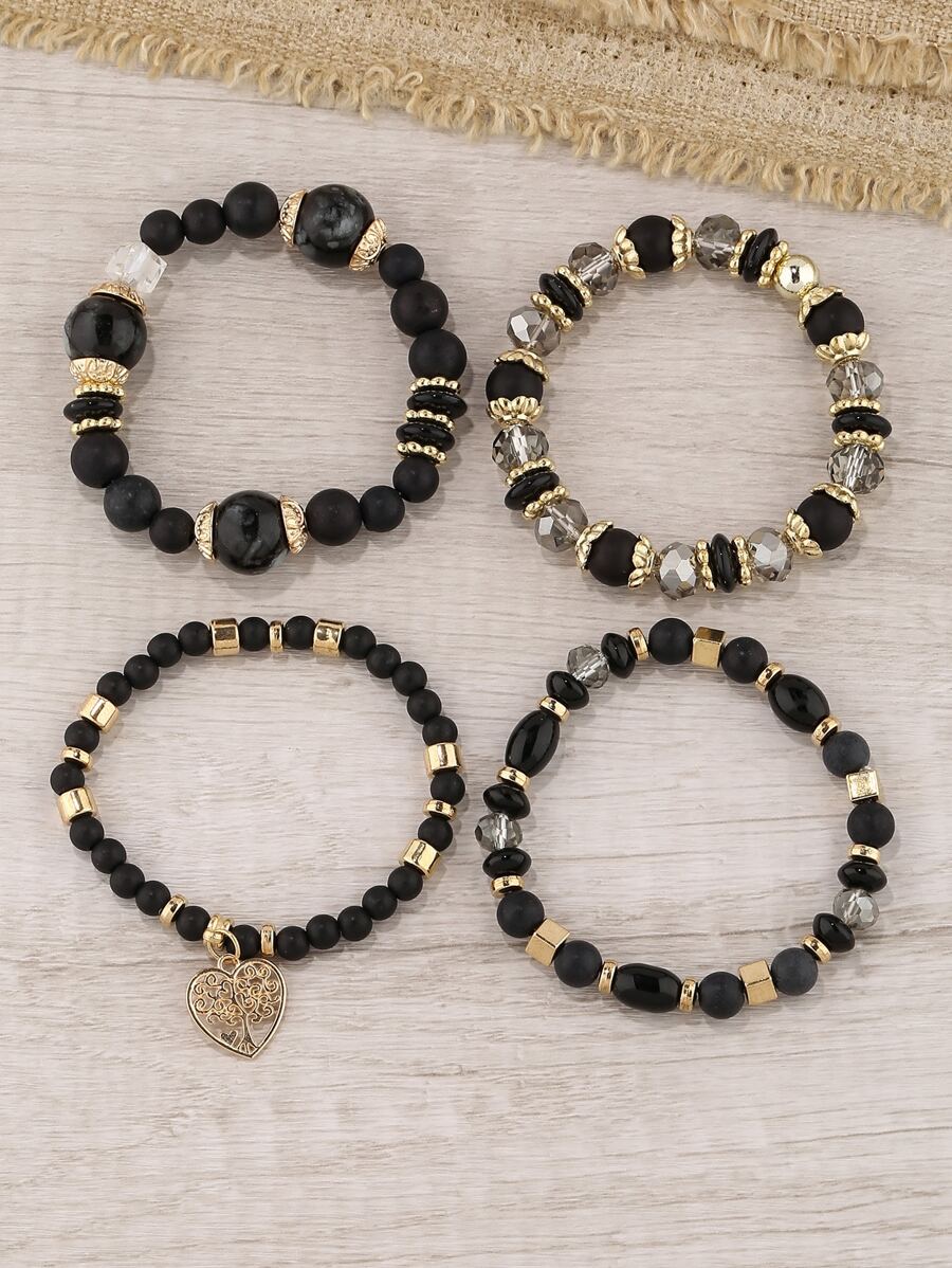 Σετ 4 Γυναικεία Βραχιόλια με Μαύρες Χάντρες και Χρυσό Μοτίφ