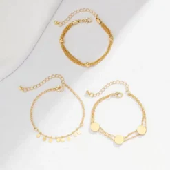 Σετ 3 Γυναικεία Βραχιόλια Gold Layering με Φλουριά και Minimal Στοιχεία