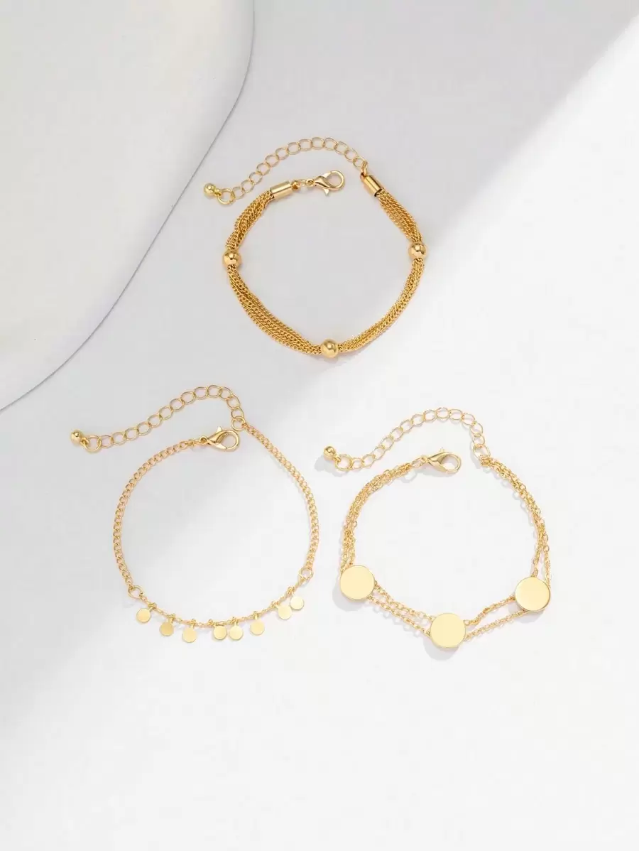 Σετ 3 Γυναικεία Βραχιόλια Gold Layering με Φλουριά και Minimal Στοιχεία