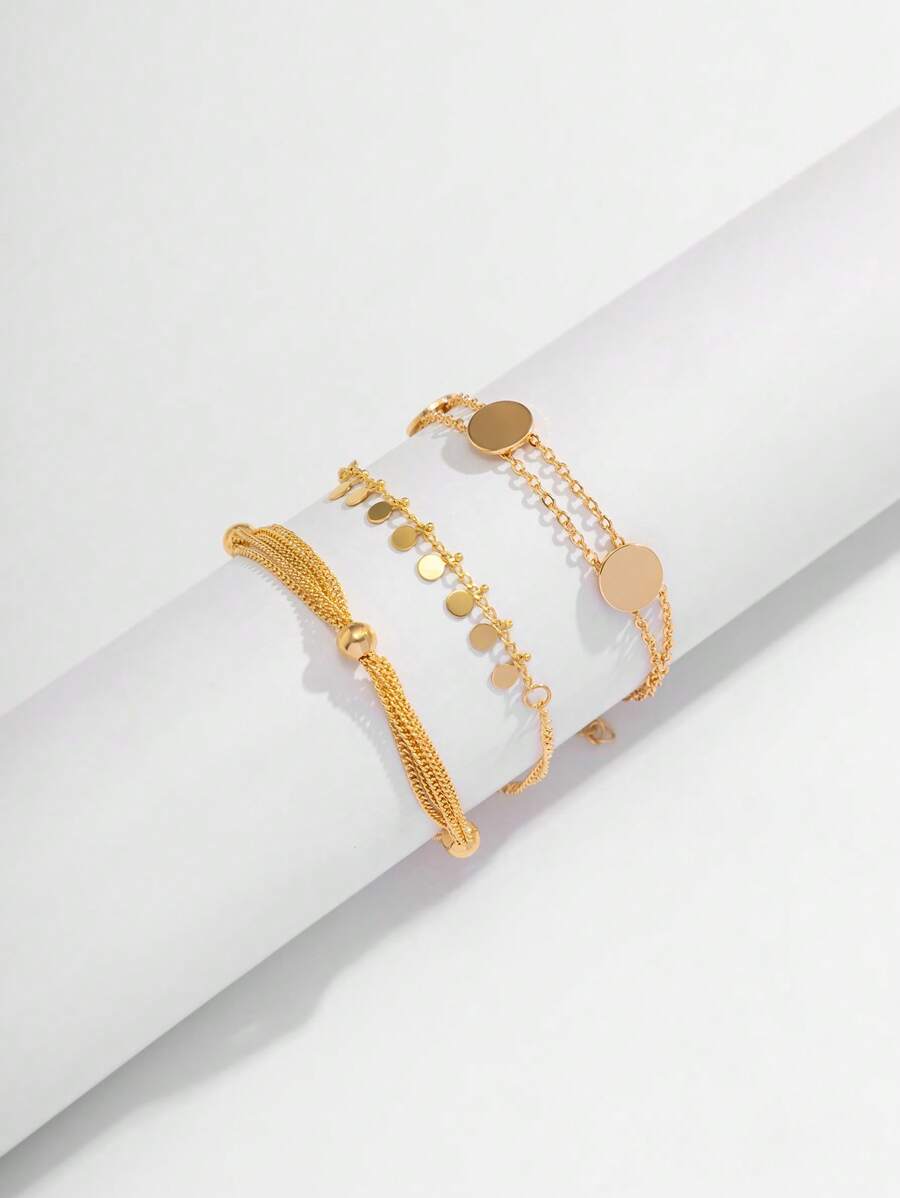 Σετ 3 Γυναικεία Βραχιόλια Gold Layering με Φλουριά και Minimal Στοιχεία