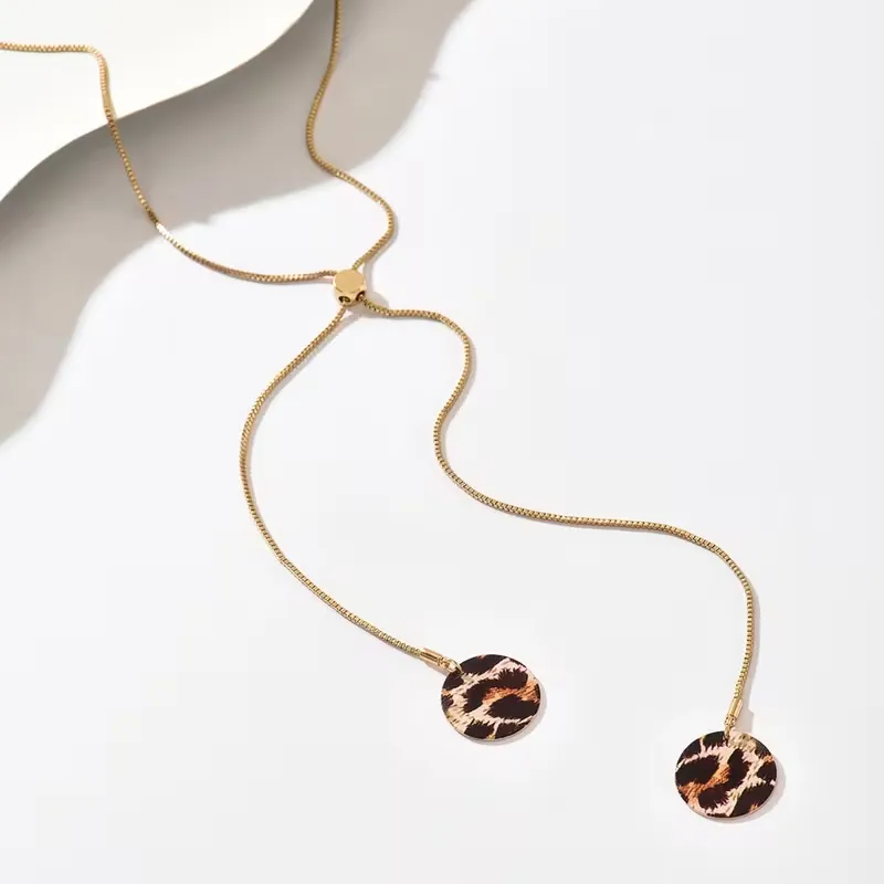 Χρυσό μακρύ κολιέ Y-Lariat με στρογγυλά leopard στοιχεία