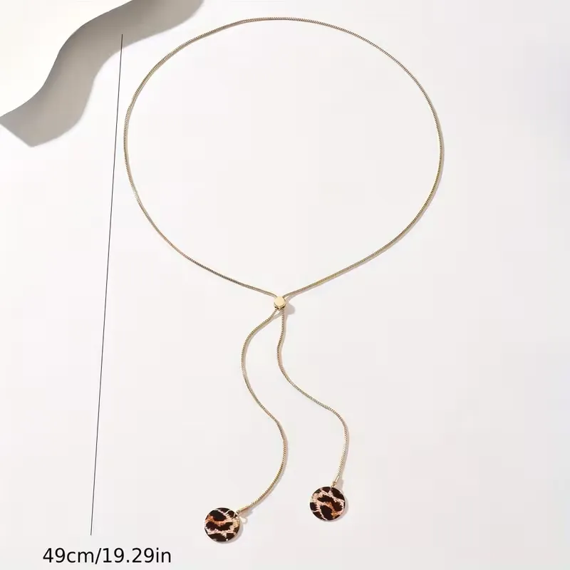 Χρυσό μακρύ κολιέ Y-Lariat με στρογγυλά leopard στοιχεία