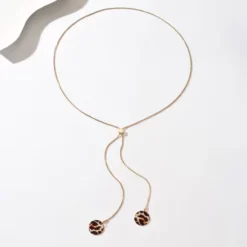 Χρυσό μακρύ κολιέ Y-Lariat με στρογγυλά leopard στοιχεία