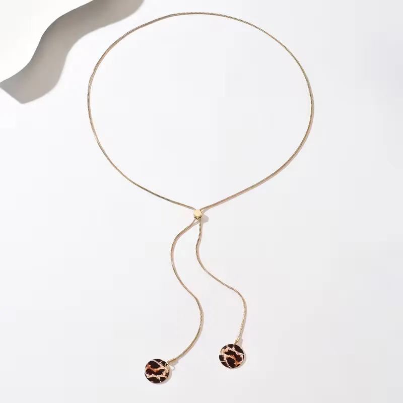 Χρυσό μακρύ κολιέ Y-Lariat με στρογγυλά leopard στοιχεία