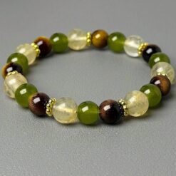 Χειροποίητο βραχιόλι με καφέ χάντρες από μάτι της τίγρης και κρυστάλλους.