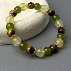 Χειροποίητο βραχιόλι με καφέ χάντρες από μάτι της τίγρης και κρυστάλλους.