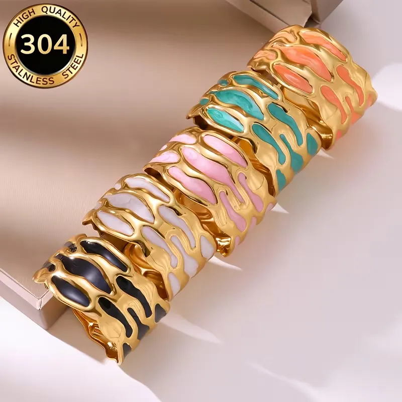 Χρυσό βραχιόλι cuff από ανοξείδωτο ατσάλι 304 με πολύχρωμο σμάλτο σε σχήμα σταγόνας.