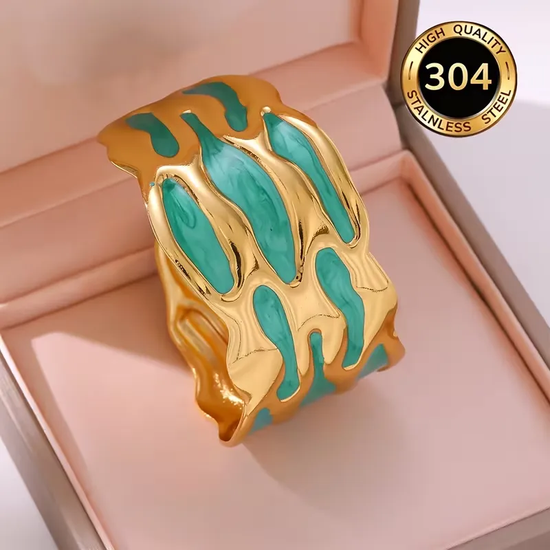 Χρυσό βραχιόλι cuff από ανοξείδωτο ατσάλι 304 με πολύχρωμο σμάλτο σε σχήμα σταγόνας.