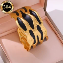 Χρυσό βραχιόλι cuff από ανοξείδωτο ατσάλι 304 με πολύχρωμο σμάλτο σε σχήμα σταγόνας.