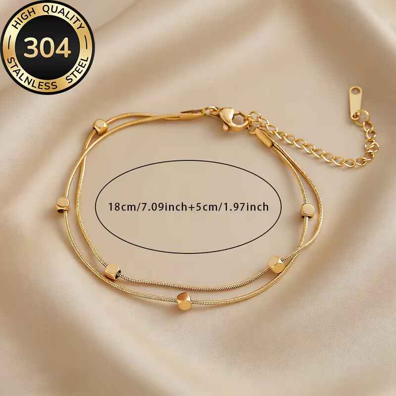 Γυναικείο διπλό βραχιόλι από χρυσό και ασημί ανοξείδωτο ατσάλι 304 με κύβους.