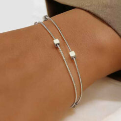 Γυναικείο διπλό βραχιόλι από χρυσό και ασημί ανοξείδωτο ατσάλι 304 με κύβους.