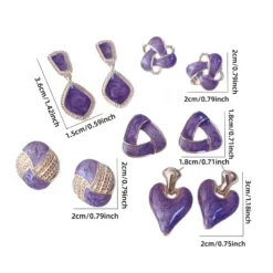 ΣΕΤ από vintage γυναικεία σκουλαρίκια με μωβ σμάλτο και χρυσές λεπτομέρειες σε διάφορα σχήματα.