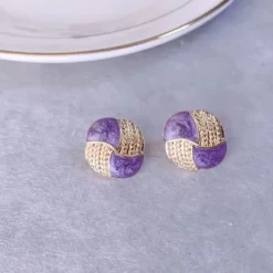 ΣΕΤ από vintage γυναικεία σκουλαρίκια με μωβ σμάλτο και χρυσές λεπτομέρειες σε διάφορα σχήματα.