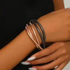 ελαστικών μεταλλικών βραχιολιών με πλέξη snake bone σε χρυσό, ασημί και ροζ χρυσό χρώμα