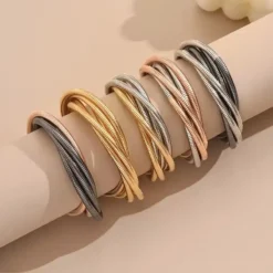 ελαστικών μεταλλικών βραχιολιών με πλέξη snake bone σε χρυσό, ασημί και ροζ χρυσό χρώμα