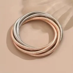 ελαστικών μεταλλικών βραχιολιών με πλέξη snake bone σε χρυσό, ασημί και ροζ χρυσό χρώμα