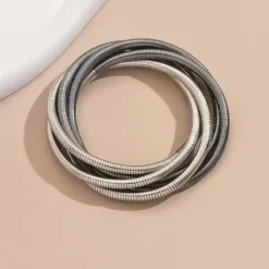 ελαστικών μεταλλικών βραχιολιών με πλέξη snake bone σε χρυσό, ασημί και ροζ χρυσό χρώμα