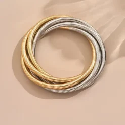 ελαστικών μεταλλικών βραχιολιών με πλέξη snake bone σε χρυσό, ασημί και ροζ χρυσό χρώμα
