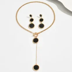 Γυναικείο σετ κοσμημάτων με χρυσό κολιέ τύπου Y και μακριά σκουλαρίκια με μαύρους κύκλους