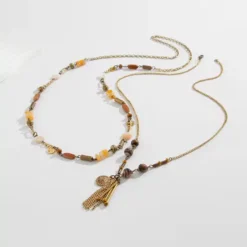 Μακρύ διπλό γυναικείο κολιέ σε boho στυλ με φυσικές καφέ και πορτοκαλί πέτρες, από το Chicbee.gr