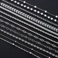 Σετ Γυναικεία Βραχιόλια Layering με Πέρλες & Στρας (12 Τεμάχια) ασημι